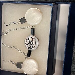 Handmade shell and hematite bracelet and earring set.